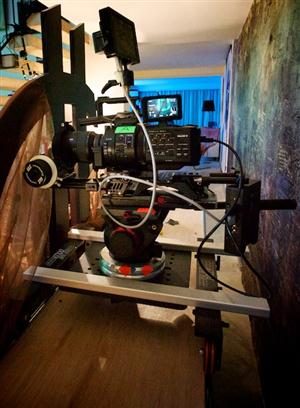 Dolly rigged for shots behind the bed